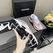 Chanel Women's Orange Low Top Logo Sneaker - 6