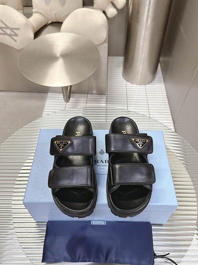 Prada Nappa Leather Slides in Black Gold - 1