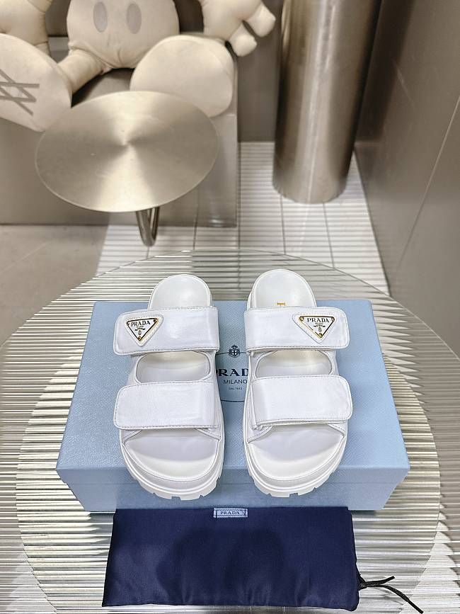 Prada Nappa Leather Slides in White Gold - 1